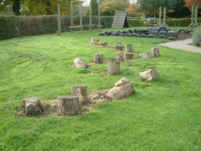 Oak stepping logs in a school playground.