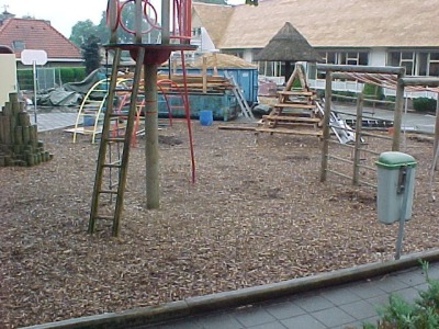 Primary school playground lined with woodchips. Photo by Bert van Geel, July 2004.